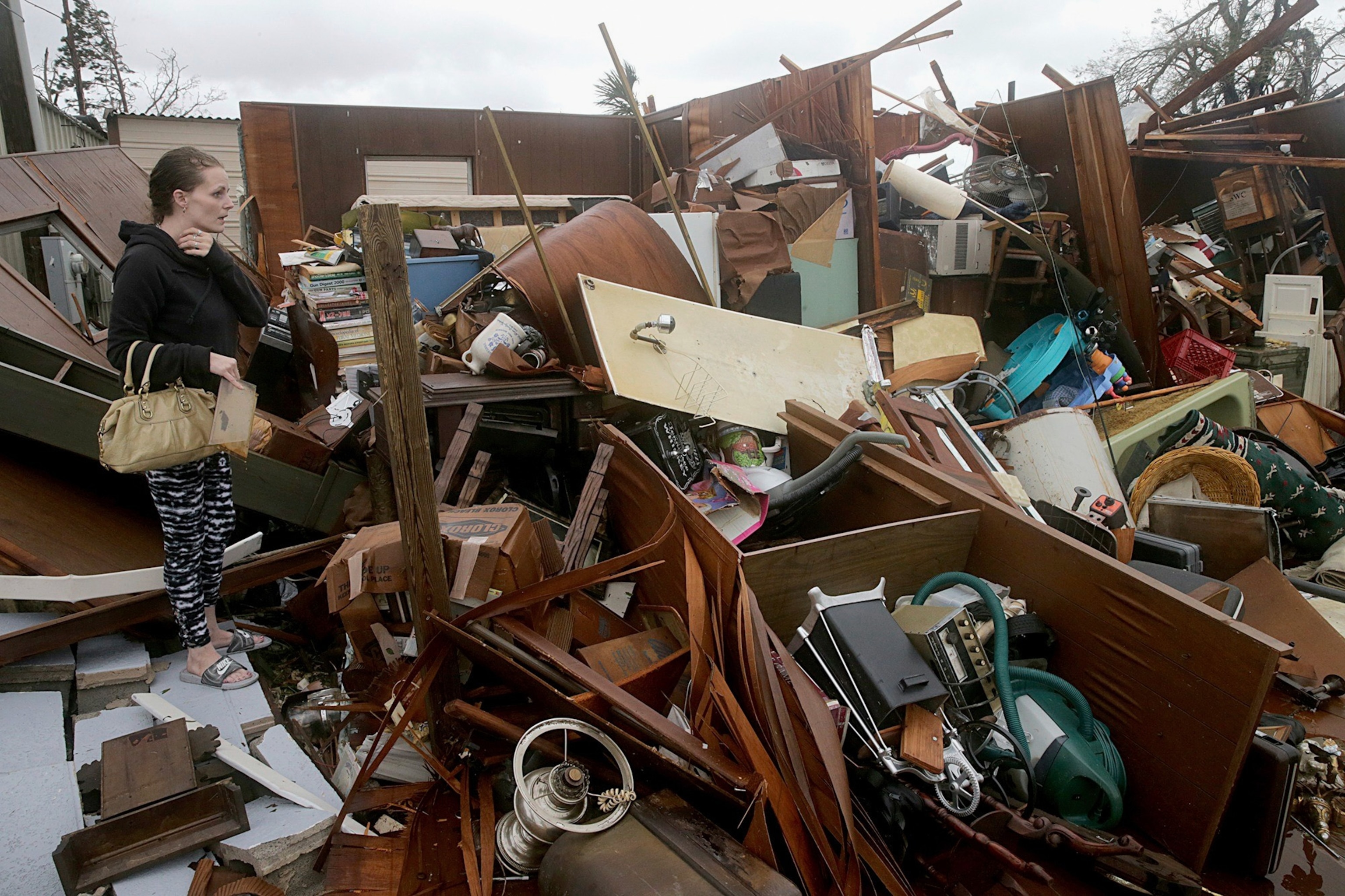 Haley Nelson inspecting her family properties in Panama City after Hurricane Michael