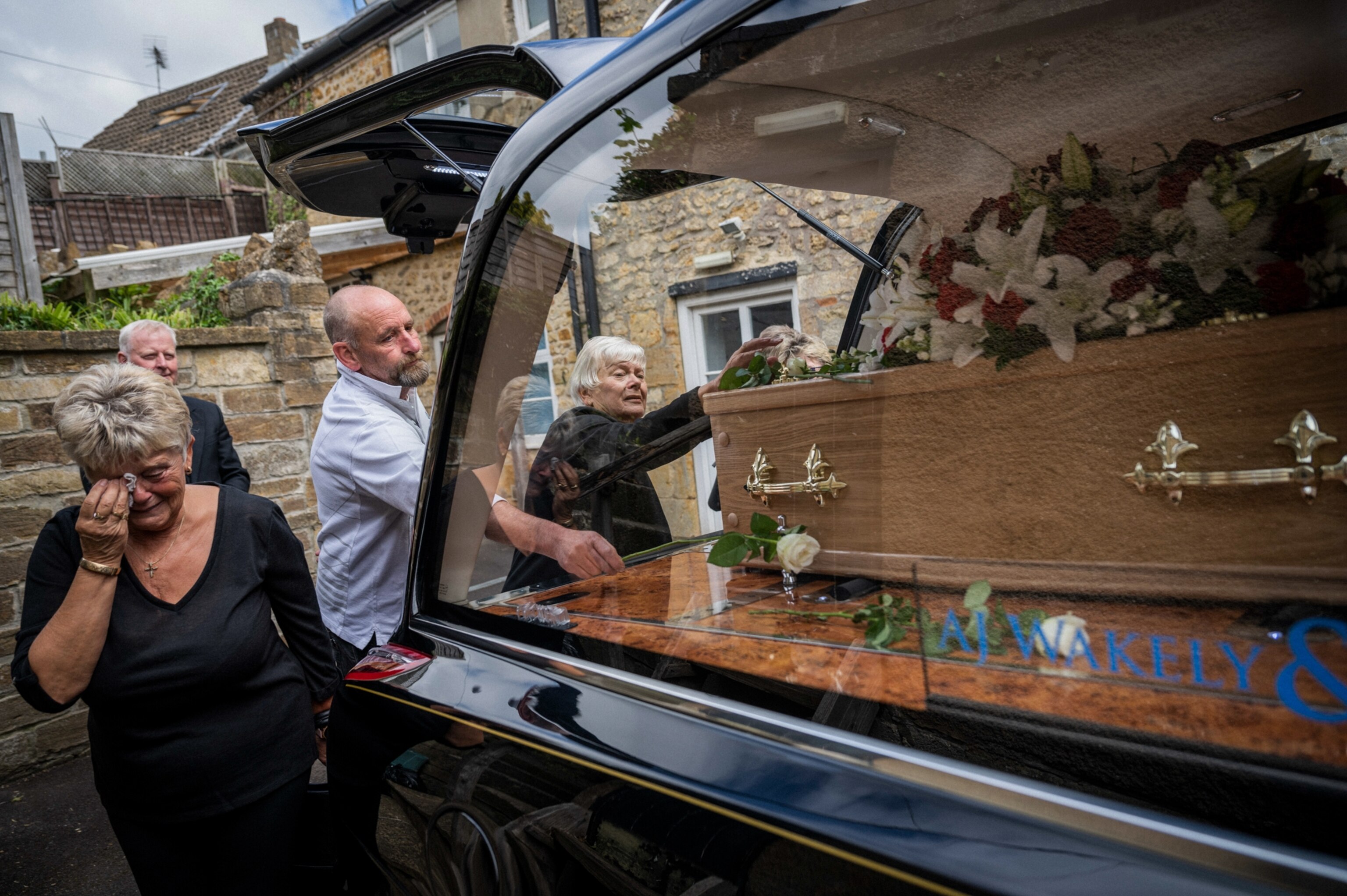 family members mourn the loss of their brother in England
