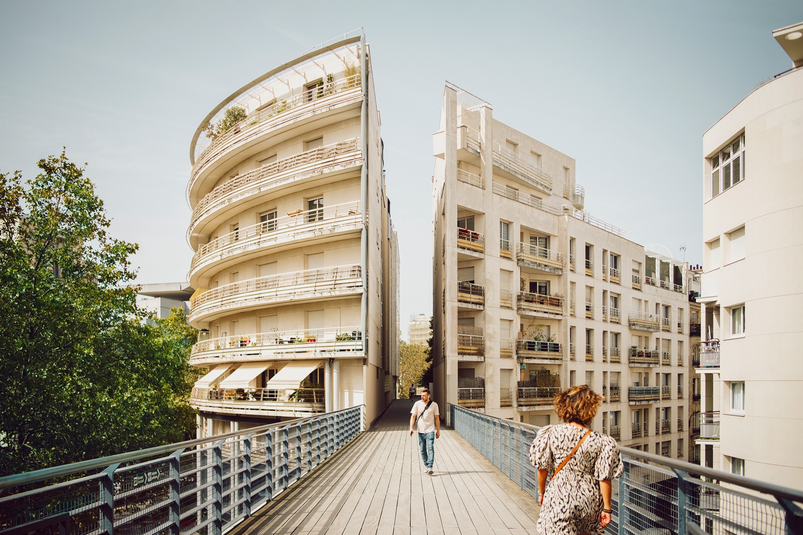 A building splits with a pathway running between, which was once an operating railroad