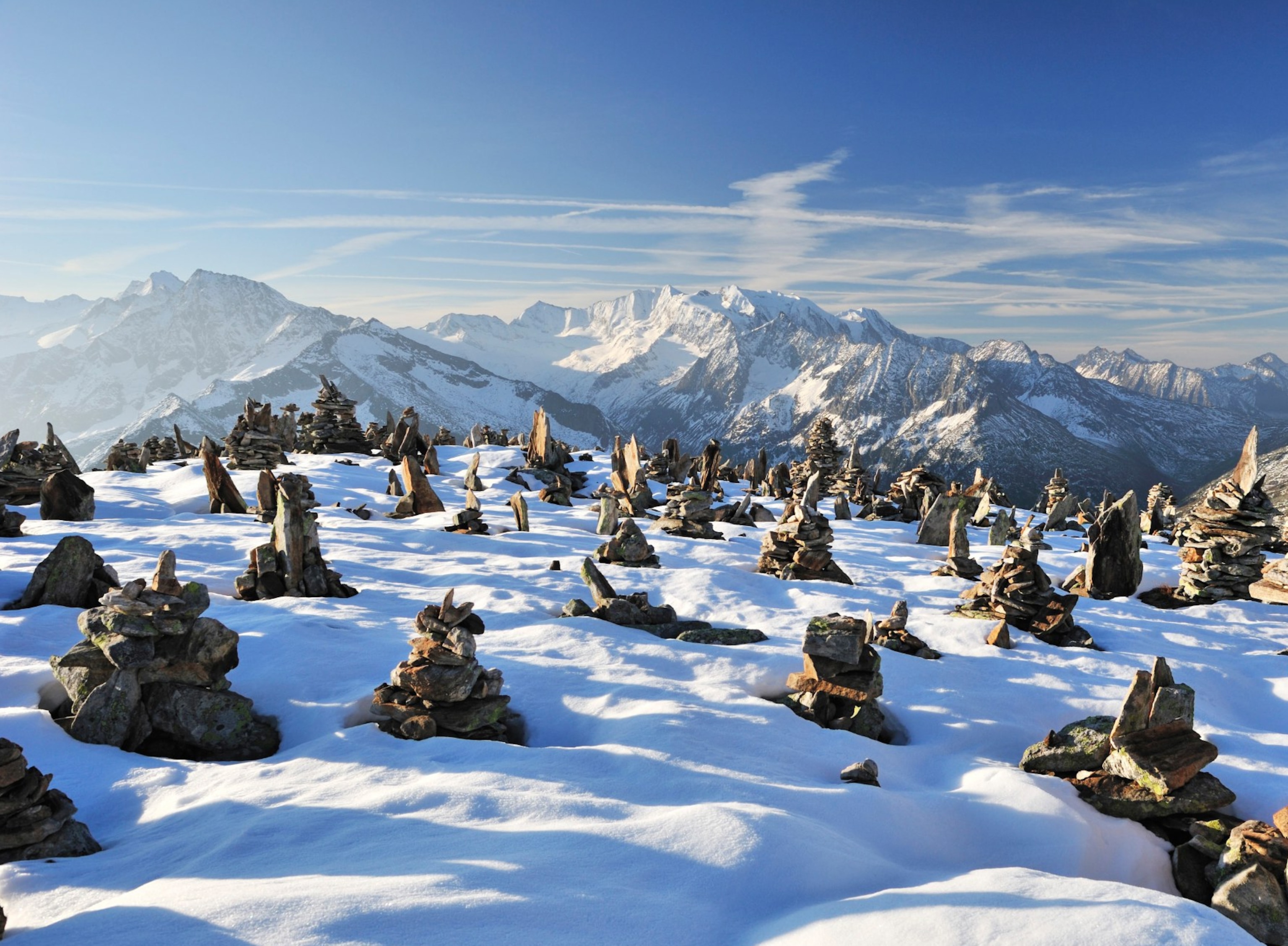 Rock cairns in snow
