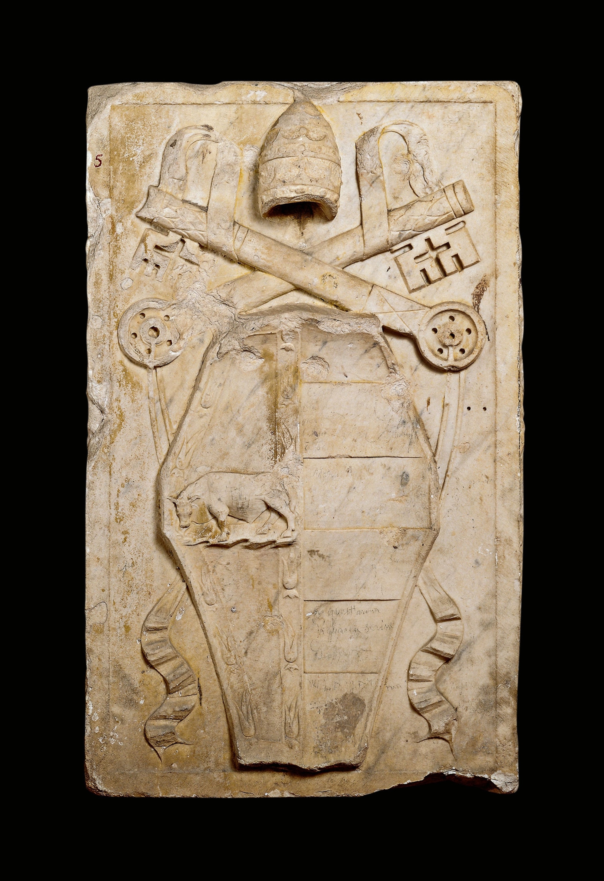 A stone relief shows the shield of Alexander VI featuring a bull, the papal miter, and the keys to Heaven