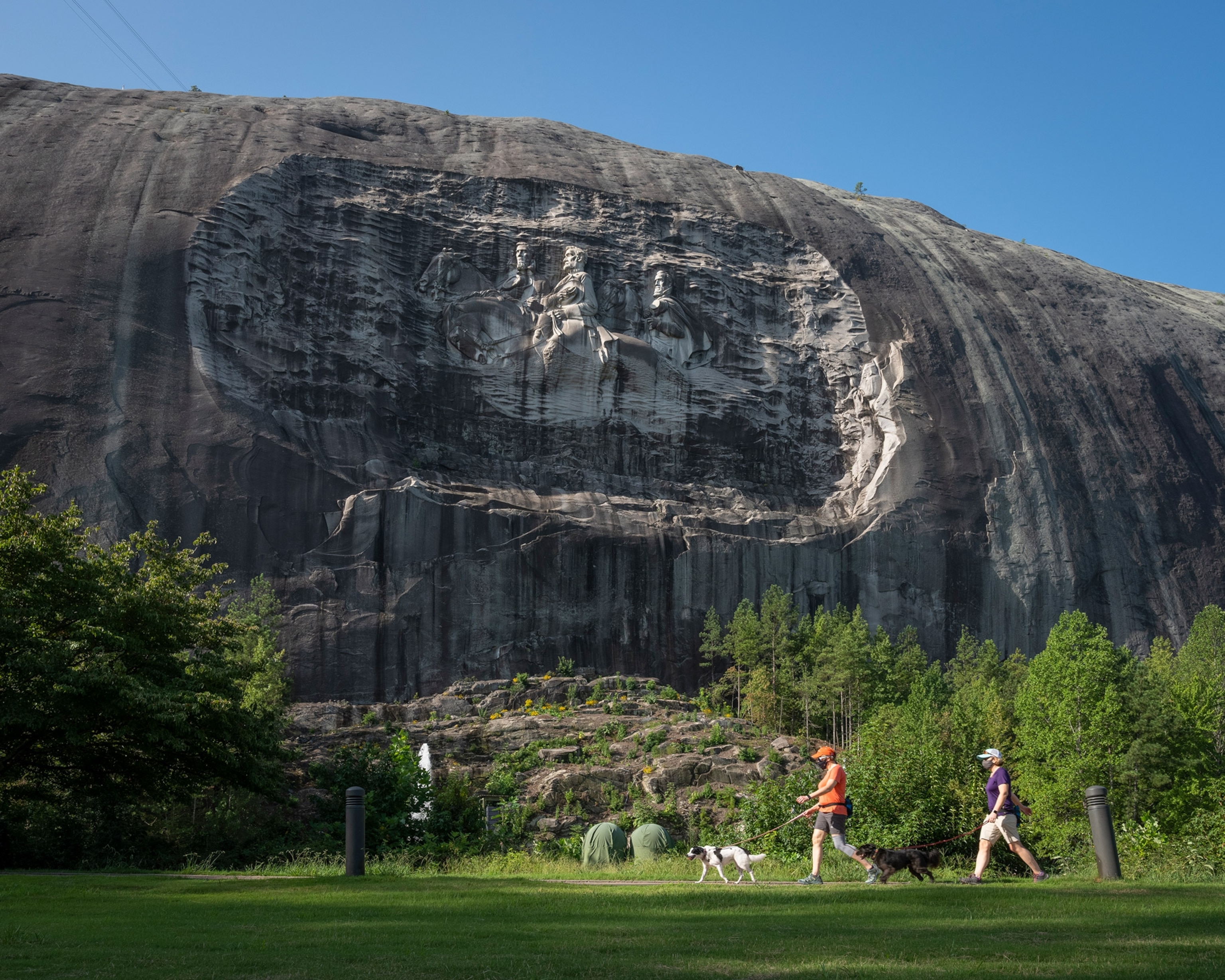 People walking in front of Stone Mountain in Georgia