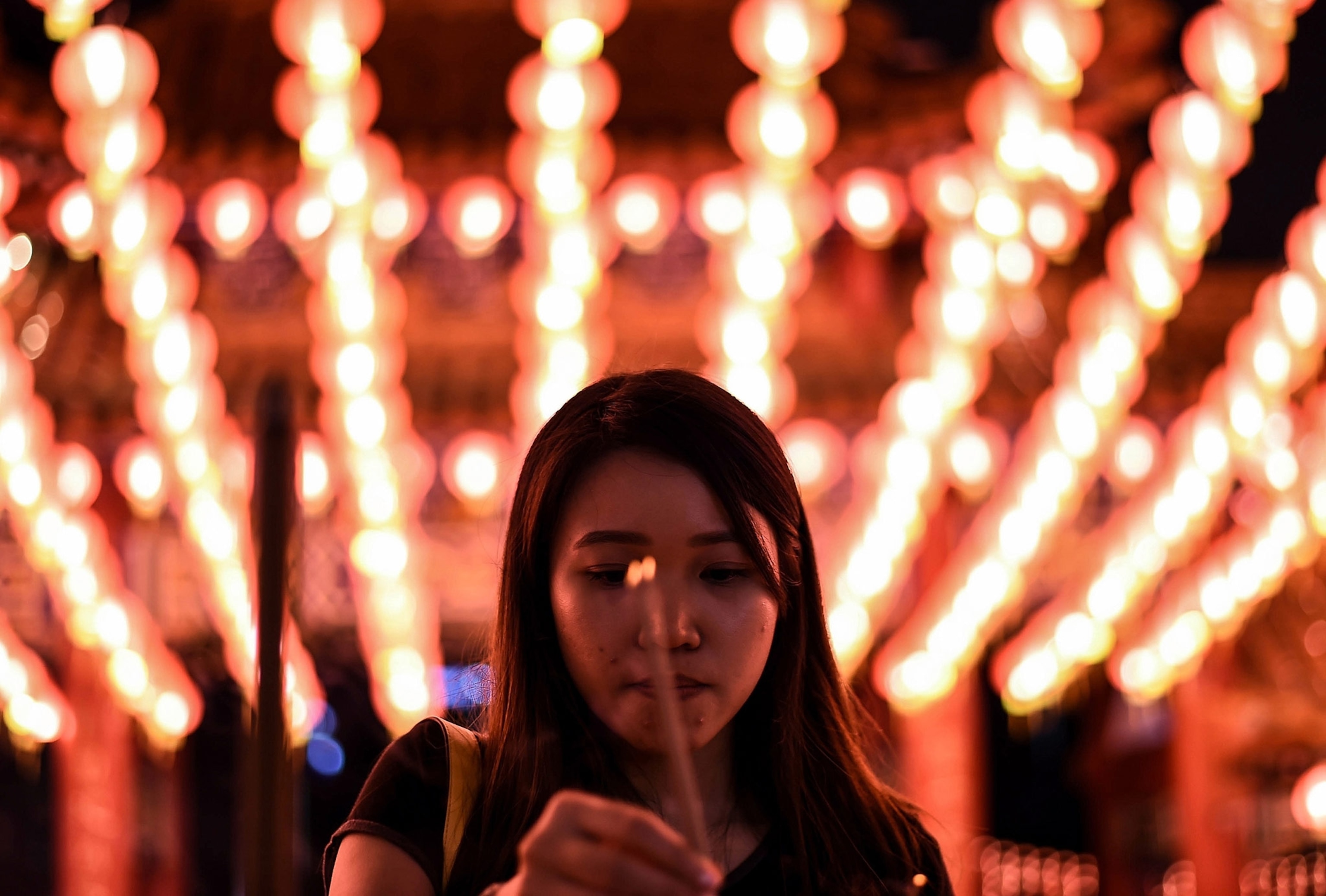 a Malaysian-Chinese at the Thean Hou temple in Kuala Lumpur, Malaysia