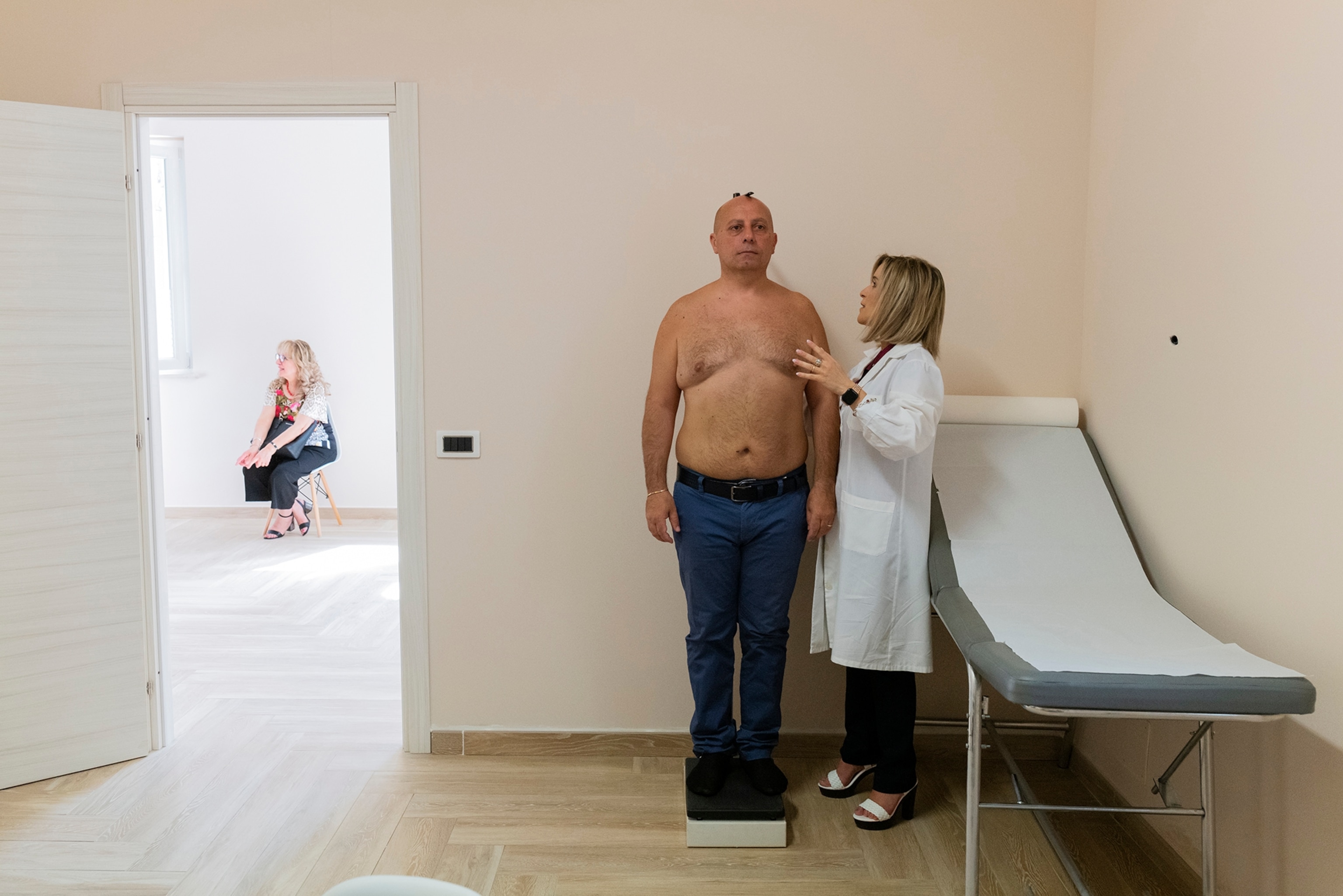Man receiving health checkup.