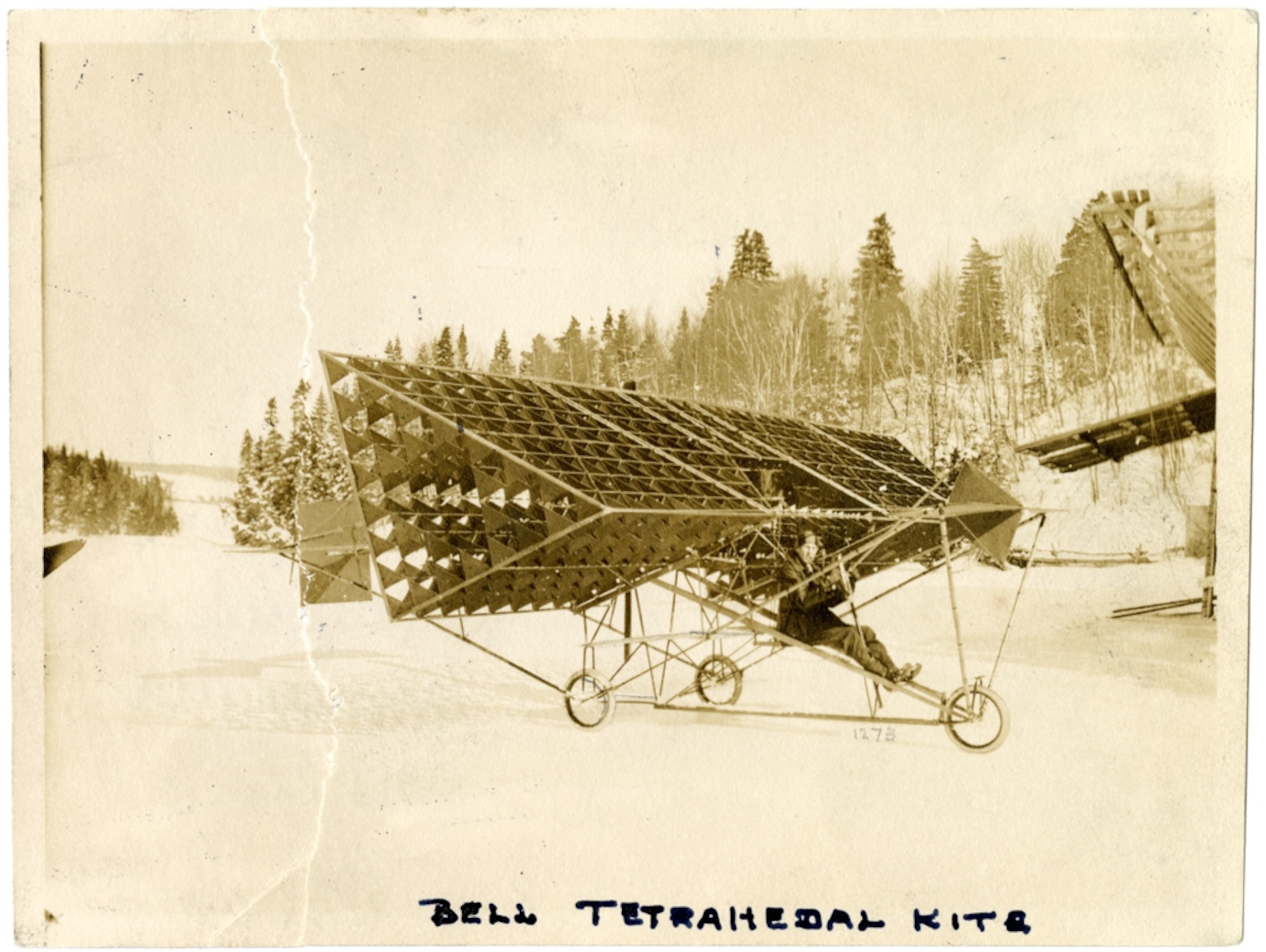 a man piloting a human-driven kite.