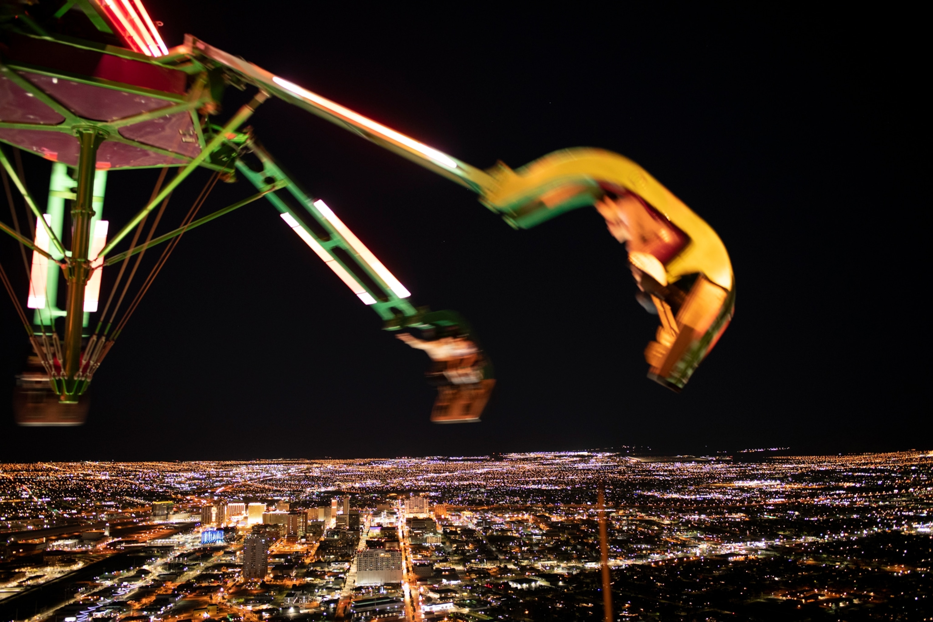 people on a ride over Las Vegas