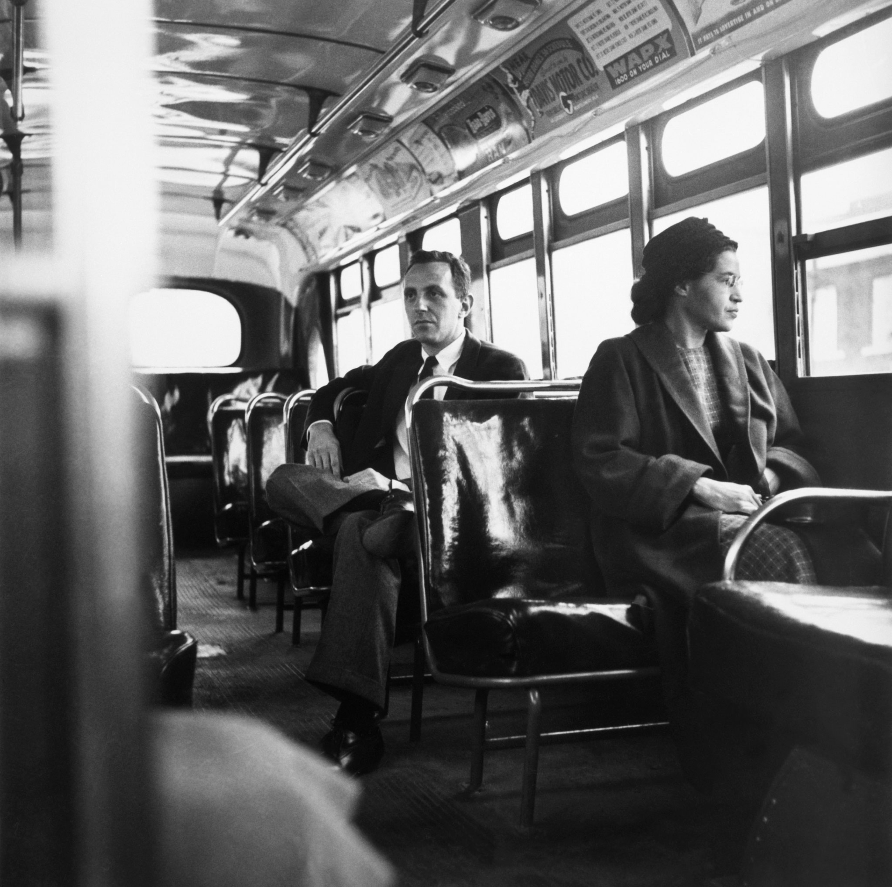 Rosa Parks sitting in the front of a bus in Alabama