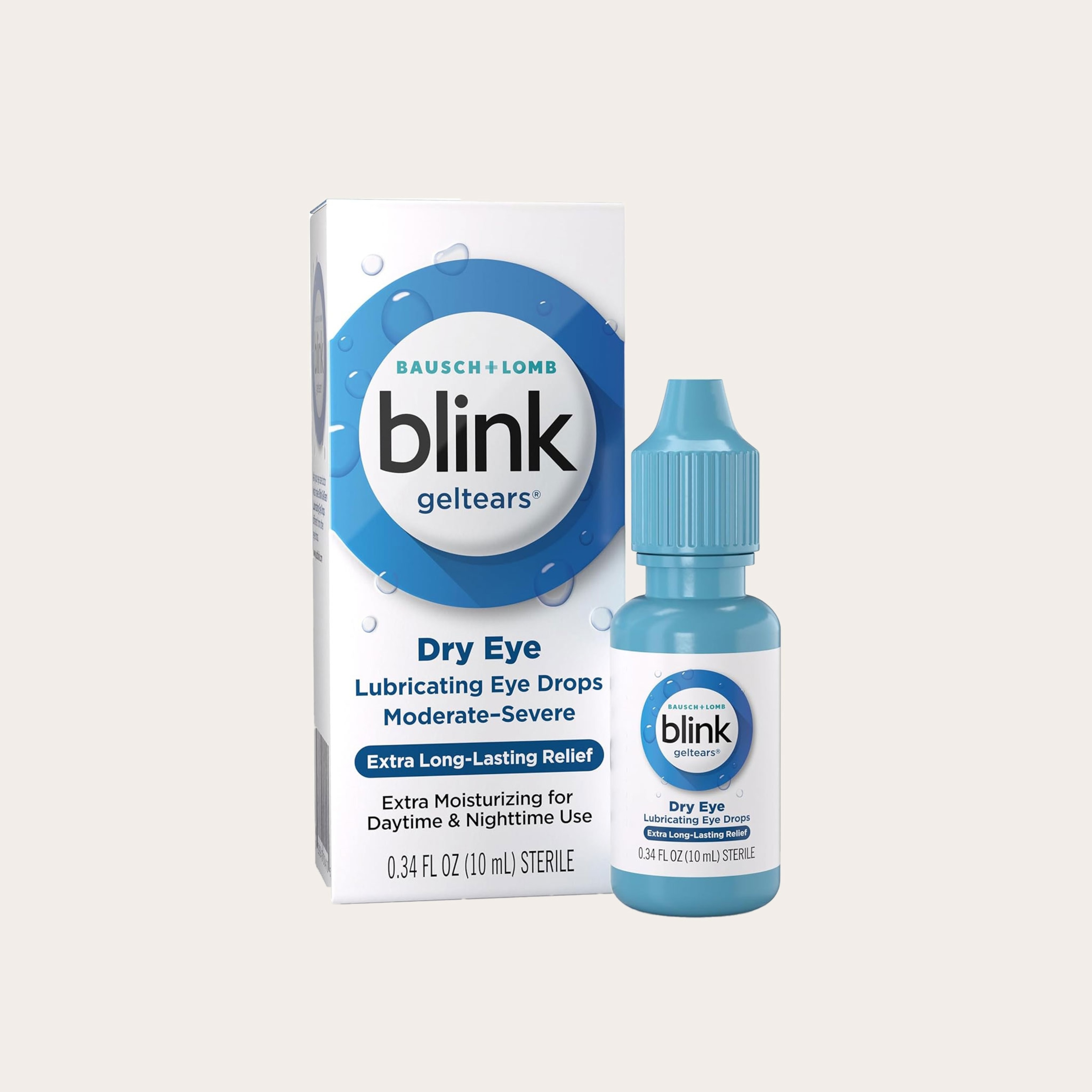 Eye dropper and cardboard packaging placed on a tan background.