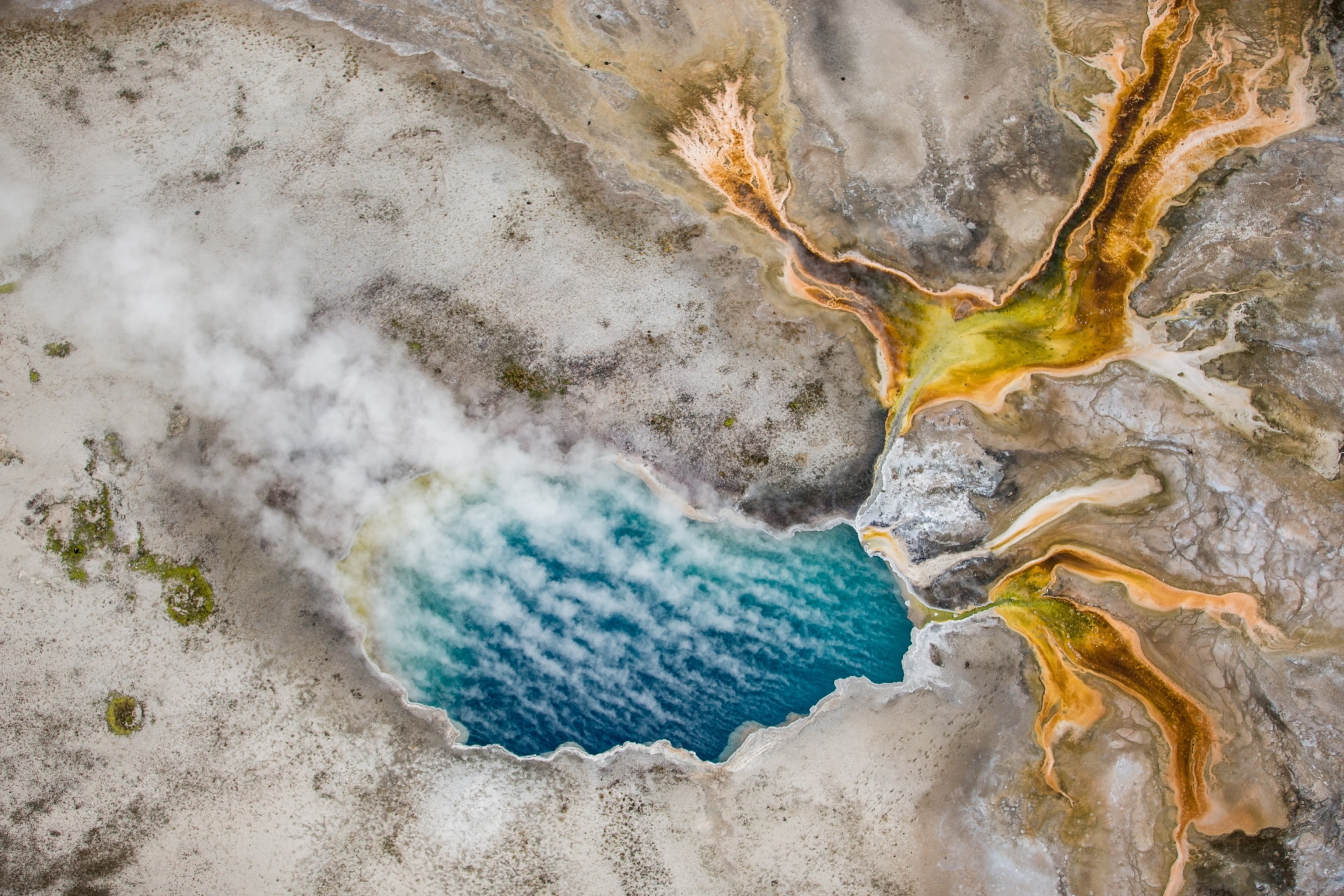 Aerial view of blue geyser pool
